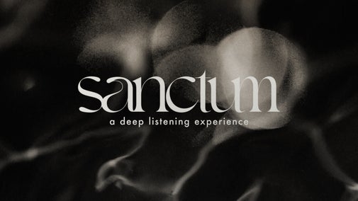 White text which reads sanctum over a black and white picture